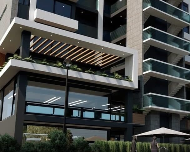 Gul Heights 2 from the street — apartment balconies stepping above the timber-slatted canopy and the glazed commercial frontage
